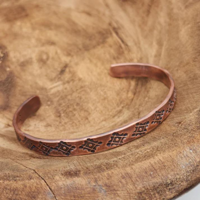Diamond Back Copper Bracelet on Wood