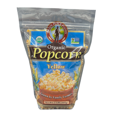 One 2 Pound Bag Of Organic Yellow Popcorn Kernels On A Clear Background
