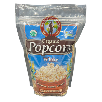 One 2 Pound Bag Of Organic White Popcorn On A Clear Background