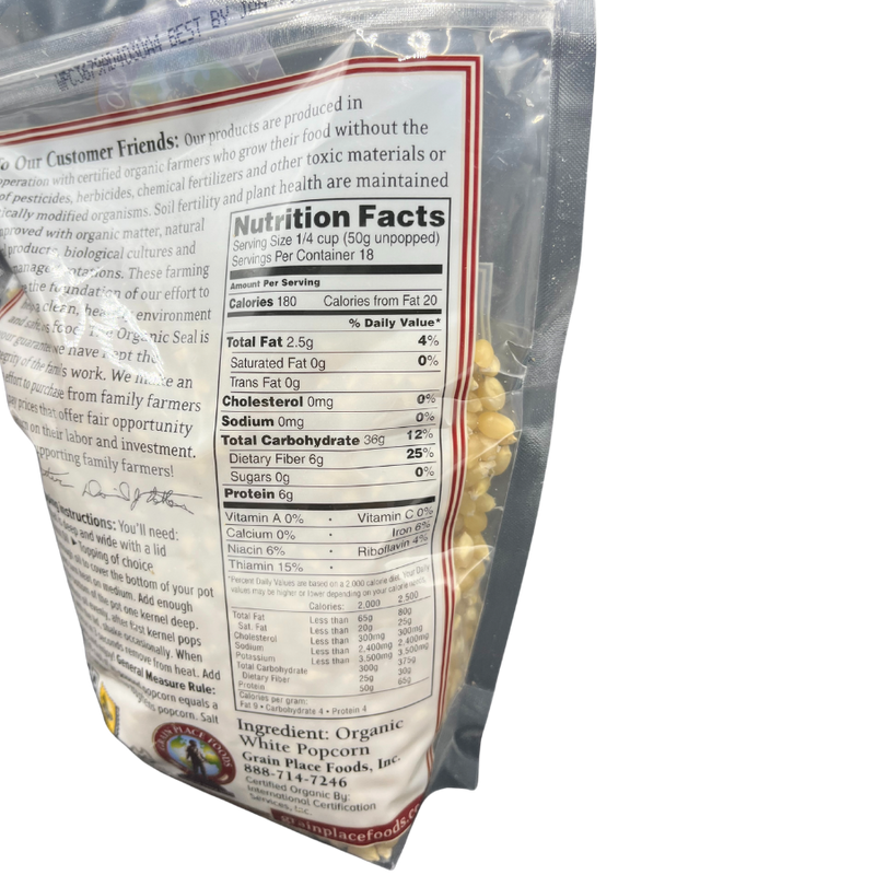 Nutrition Label For Organic White Popcorn Kernels On A Clear Background