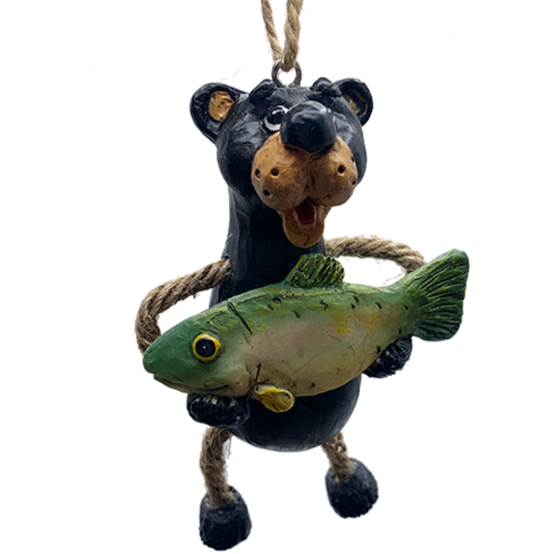 Bear ornament with jute-rope legs holding large fish