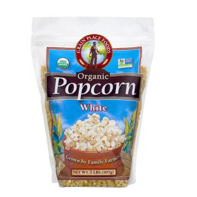 One 2 Pound Bag of Organic White Popcorn Kernels On A White Background