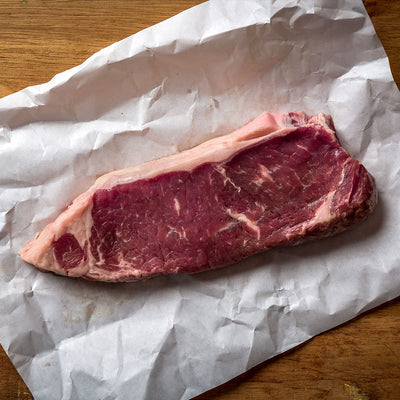 New York Strips and Beef Patties | 12 oz. Steaks and 1/3 lb. Patties | Tender, Flavorful, & Juicy | Perfect Blend Of Natural Angus & Wagyu Beef | Seasoning Of Your Choice Included | Elevate Your Meat Quality | Shipping Included