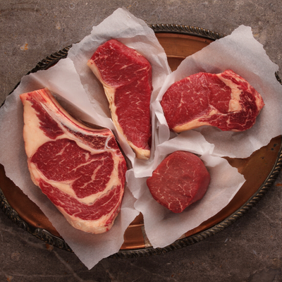 New York Strips and Beef Patties | 12 oz. Steaks and 1/3 lb. Patties | Tender, Flavorful, & Juicy | Perfect Blend Of Natural Angus & Wagyu Beef | Seasoning Of Your Choice Included | Elevate Your Meat Quality | Shipping Included