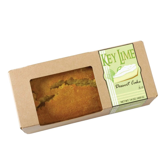 Key Lime dessert cake in a cardboard box with a green label on a white background