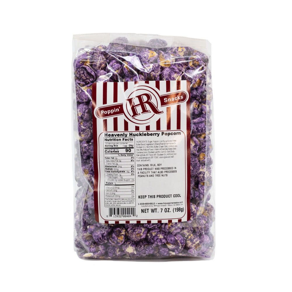 A packaged bag of Heavenly Huckleberry Popcorn by HR Poppin' Snacks with a purple and white design, indicating the flavor and brand.