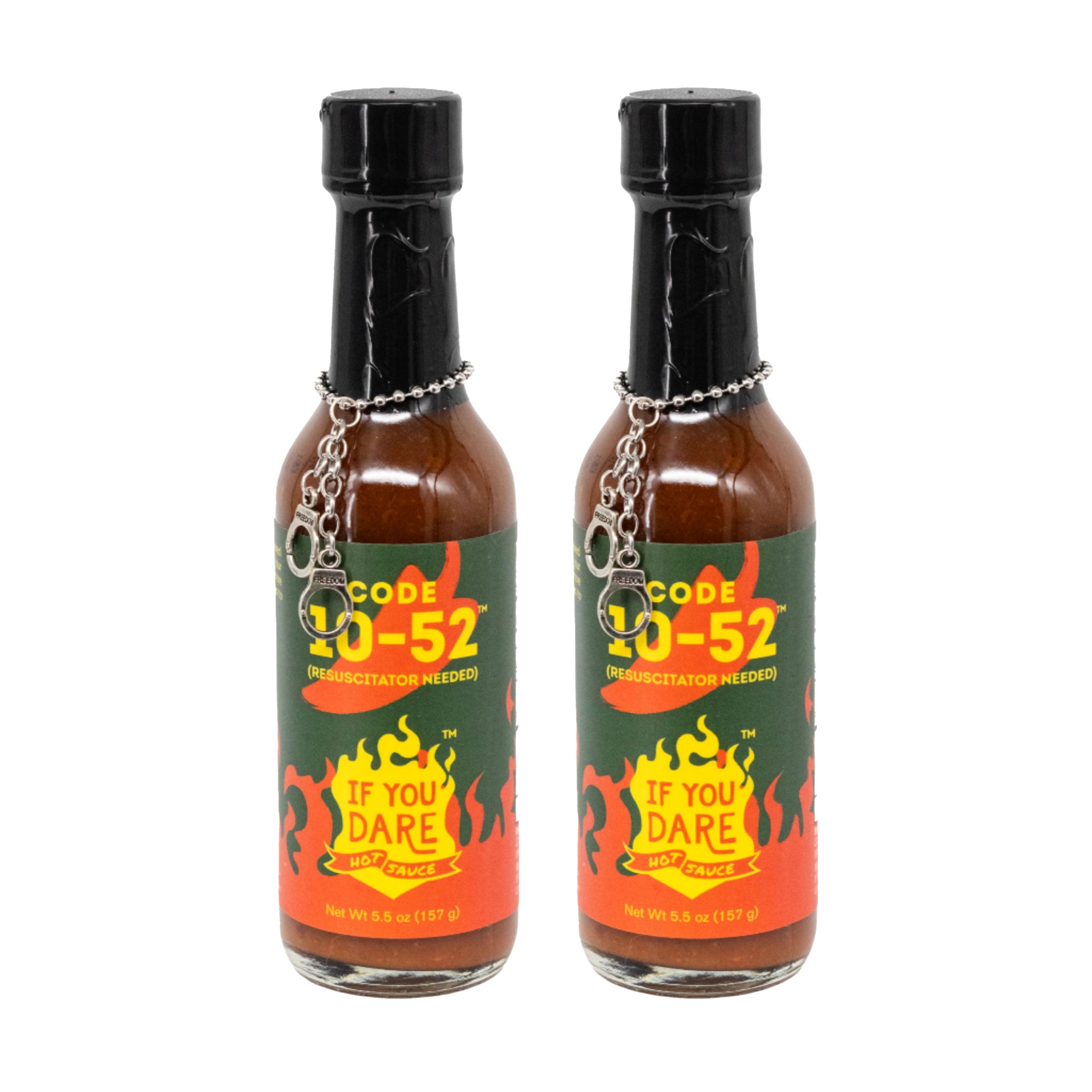 Two bottles of Code 10-52 hot sauce with black caps and colorful labels on a white background.