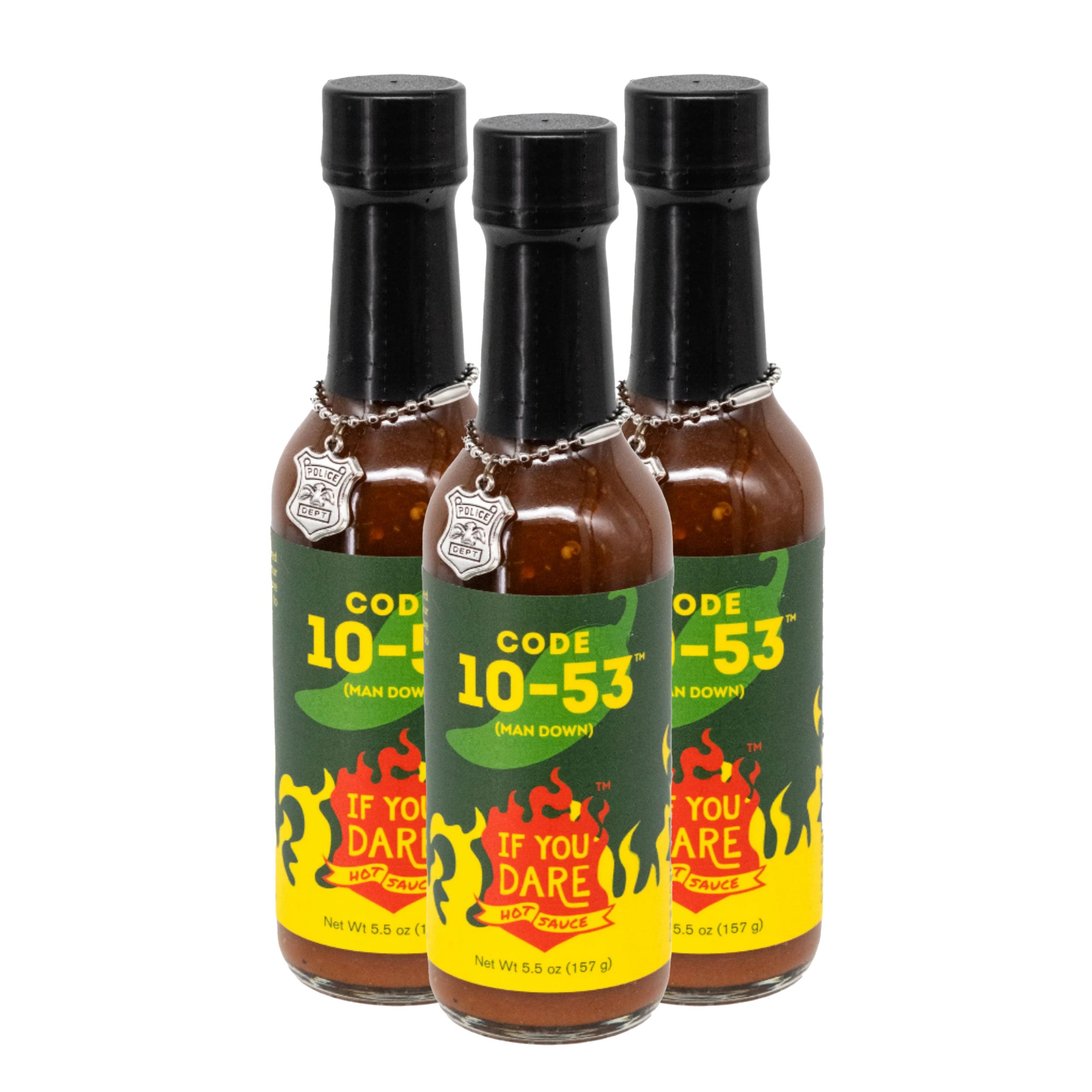 Three bottles of Code 10-53 hot sauce on a white background