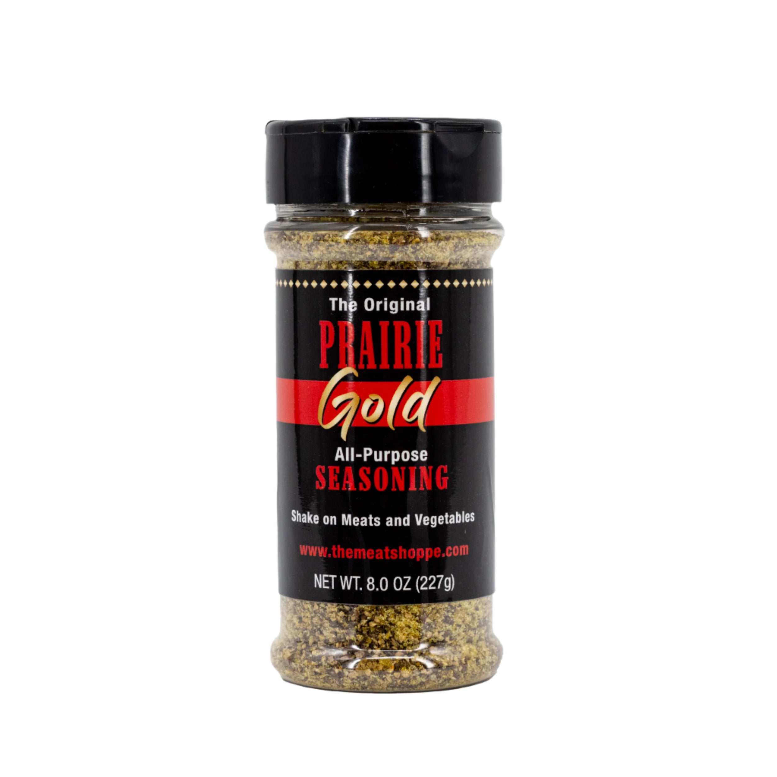 A bottle of Original Prairie Gold All-Purpose Seasoning, 8 oz size, with a black and red label, indicating it is gluten free and made in Nebraska.