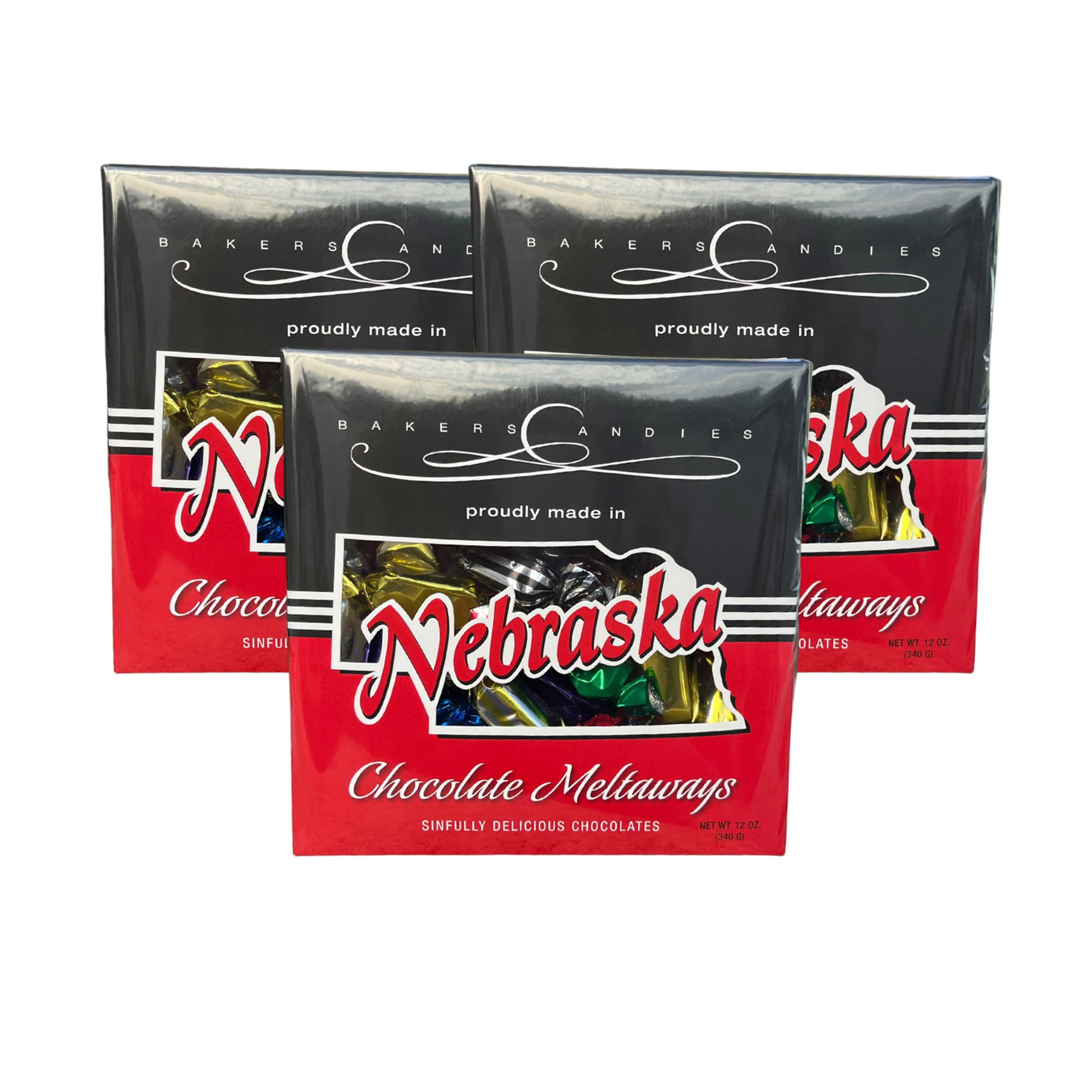 Three packages of Baker's Candies Chocolate Meltaways on a white background