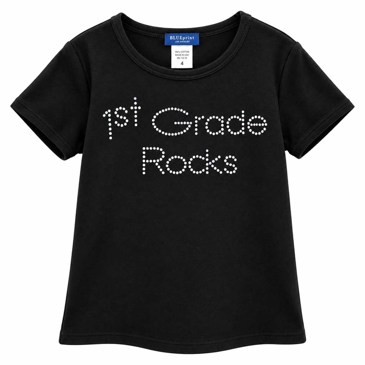 A black short-sleeve kids' t-shirt with '1st Grade Rocks' printed on the front in white rhinestone-style lettering, shown against a plain white background.