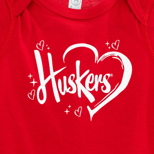 Infant Huskers Heart Onesie | Red | Multiple Sizes | Lou's Sporting Goods | 24N7IC
