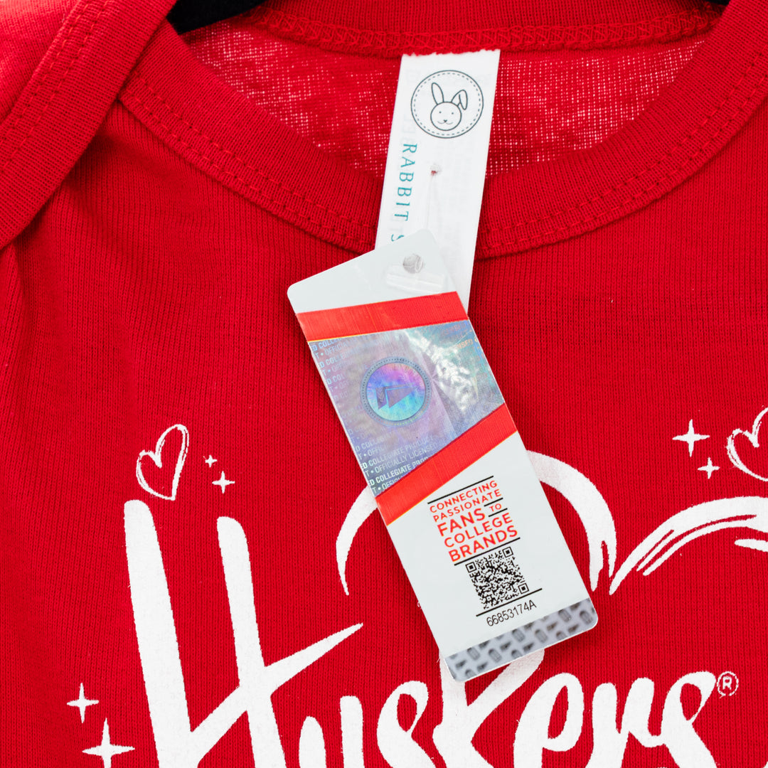 Infant Huskers Heart Onesie | Red | Multiple Sizes | Lou's Sporting Goods | 24N7IC