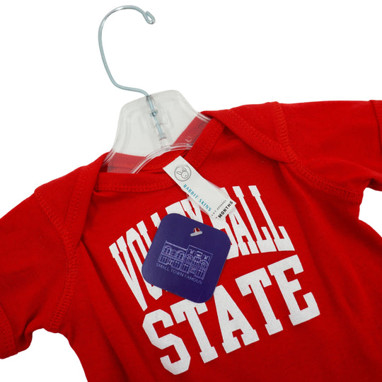 Red baby onesie with 'small town famous' text on a hanger against a white background