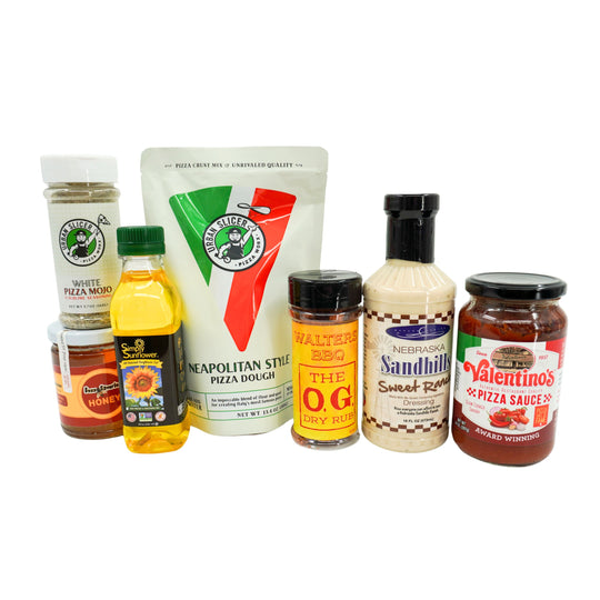 Collection of Nebraska produts and condiments on a white background
