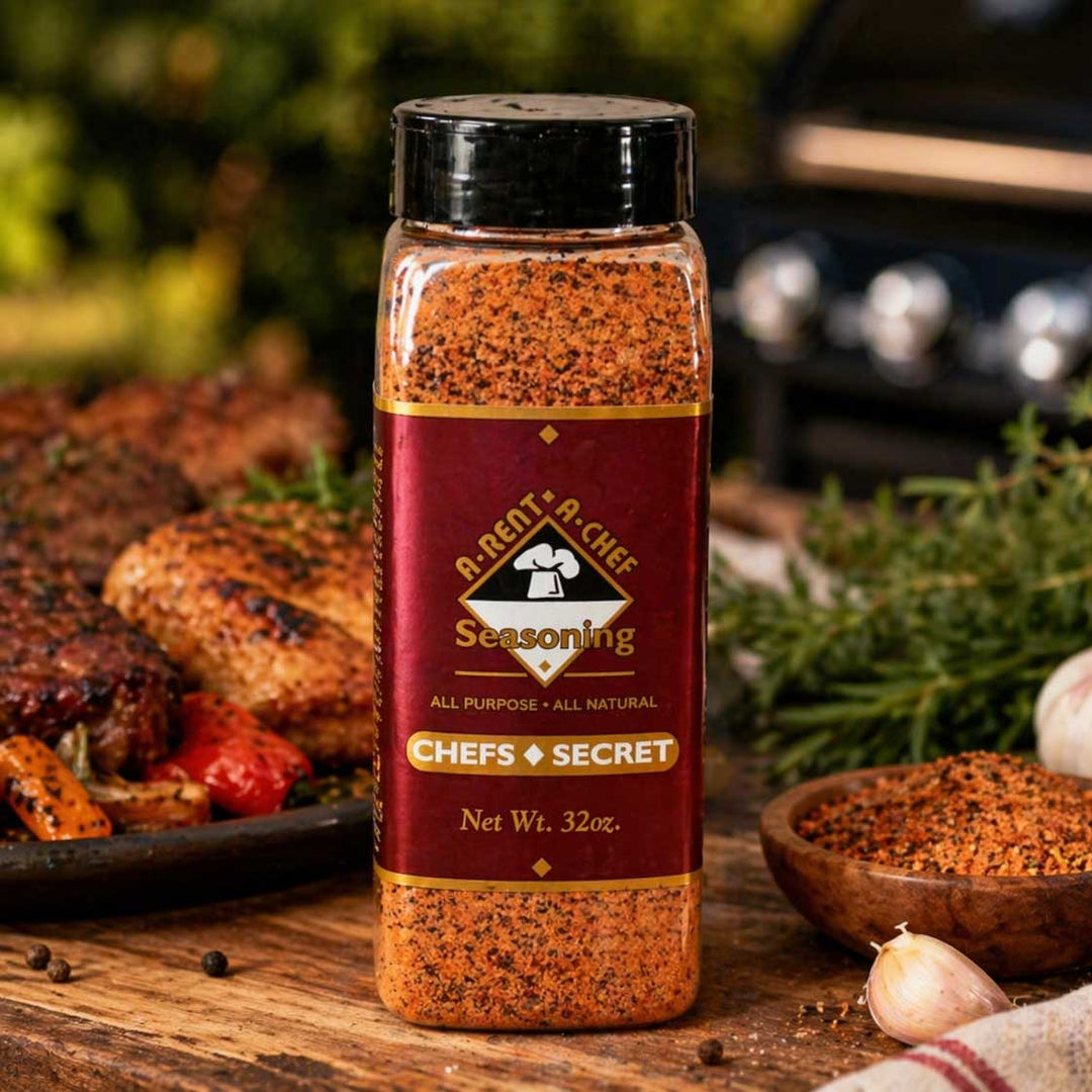 Bottle of seasoning with a grill and food in the background