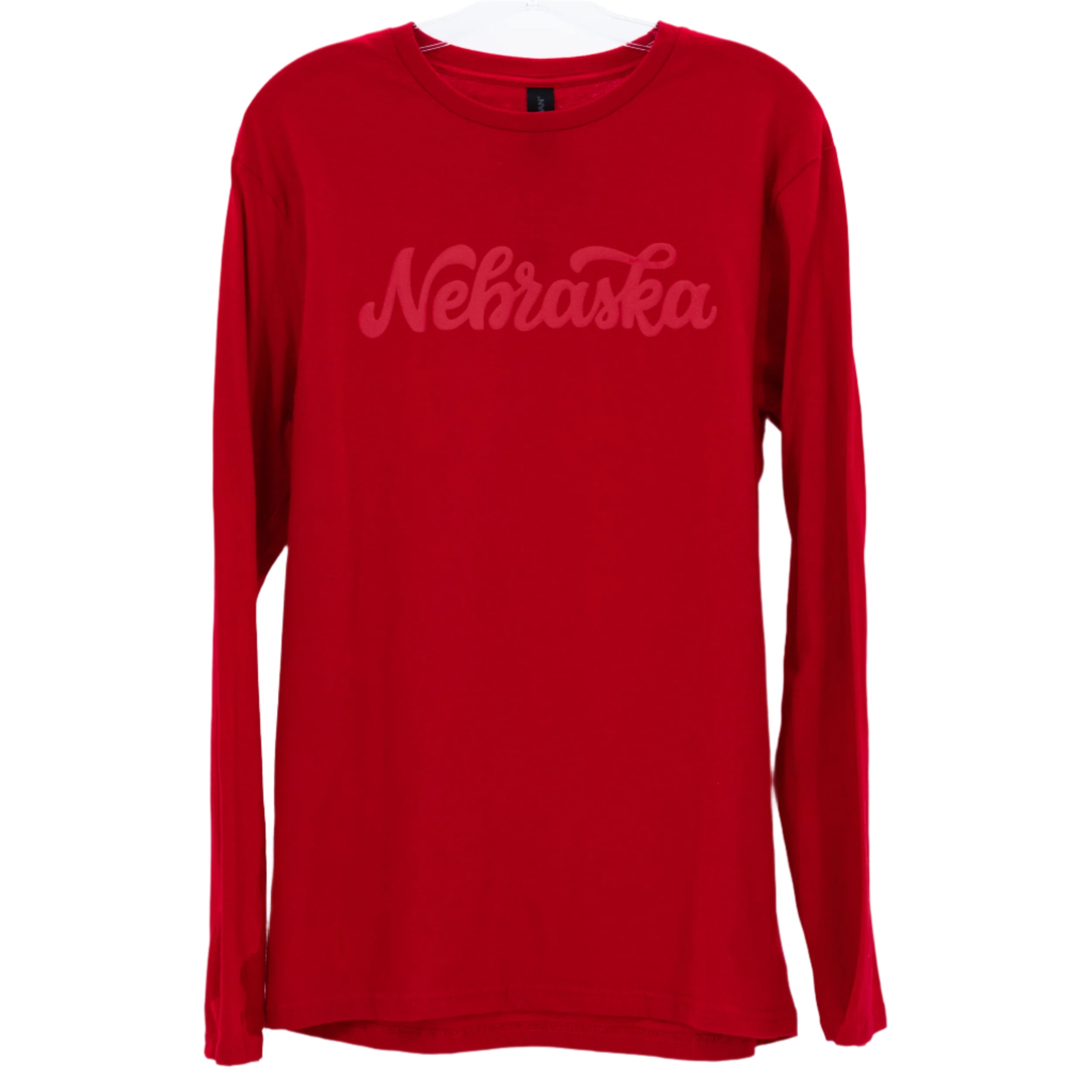 A red long sleeve crewneck shirt with 'Nebraska' written across the front in a red cursive font.