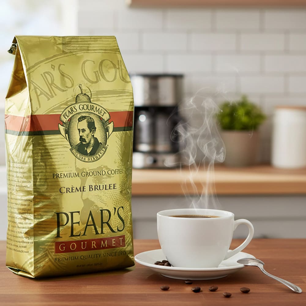 Pear's Gourmet Amaretto coffee bag with a steaming cup of coffee on a kitchen counter.