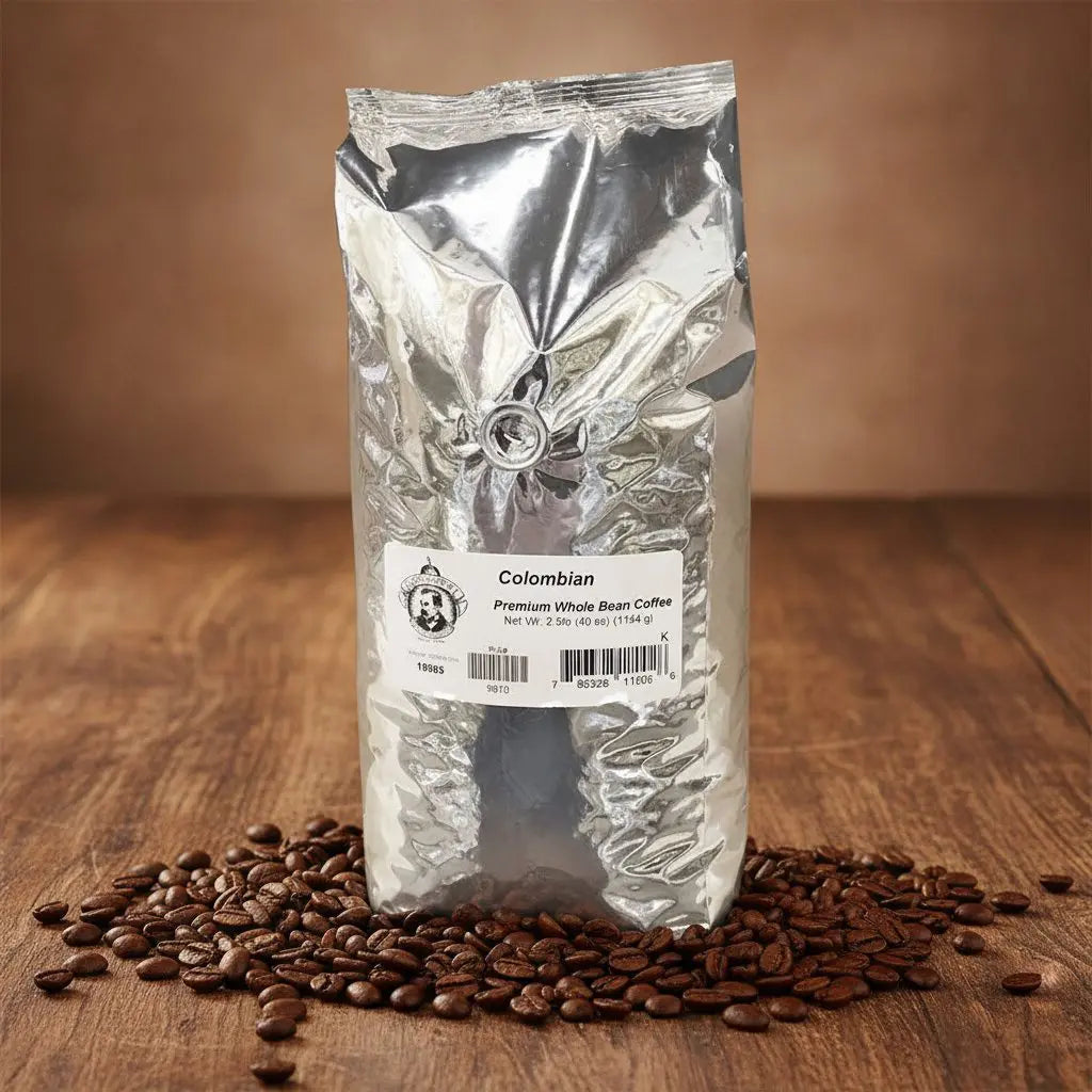Silver coffee bag labeled 'Colombian' with coffee beans on a wooden surface