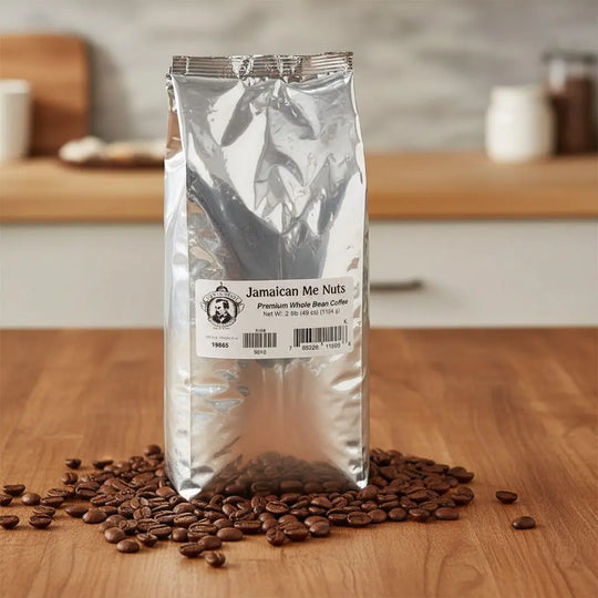 Jamaican Me Nuts coffee package with scattered beans on a wooden surface