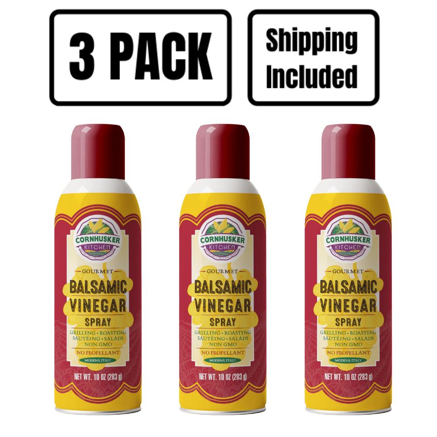 Three Cornhusker Kitchens Balsamic Vinegar Spray with red cap on a white background
