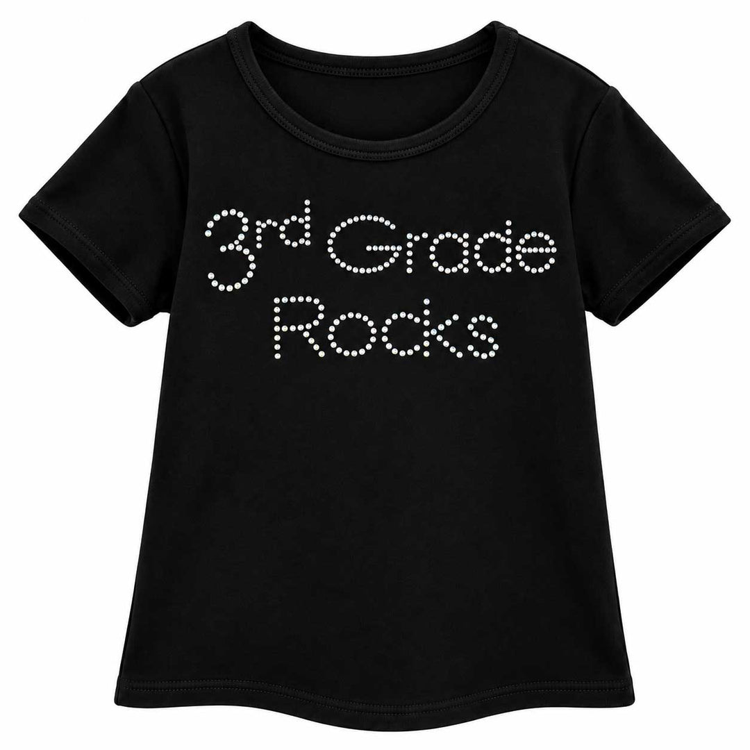 A black short-sleeve t-shirt with '3rd Grade Rocks' printed across the chest in white rhinestone-style lettering, shown on a plain white background.