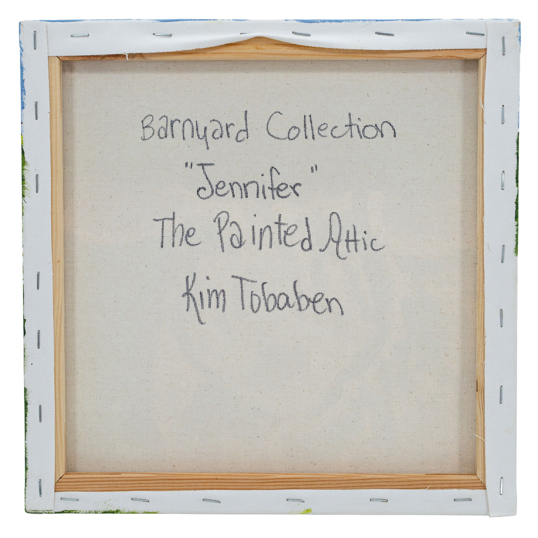 Back of a framed artwork with text indicating 'Barnyard Collection, Jennifer, The Painted Attic, Kim Tobaben'.