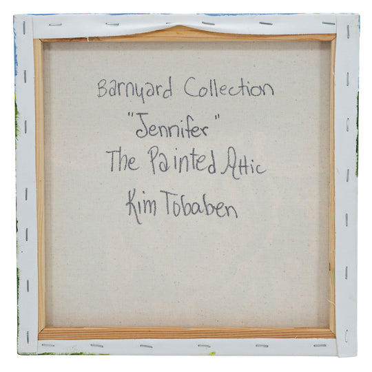 Back of a framed artwork with text indicating 'Barnyard Collection, Jennifer, The Painted Attic, Kim Tobaben'.