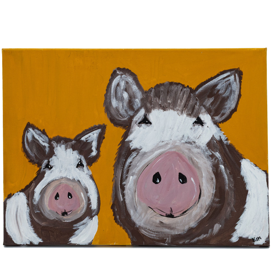 Two painted pigs on a mustard yellow background