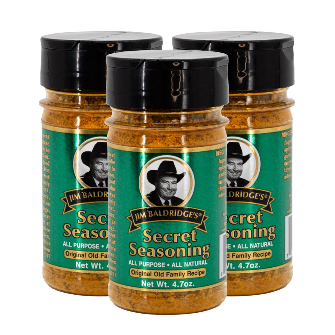 Three jars of Jim Baldridge's Secret Seasoning on a white background