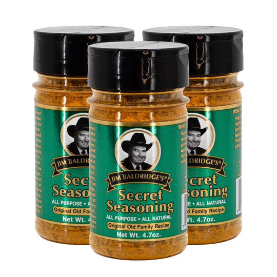 Three jars of Jim Baldridge's Secret Seasoning on a white background