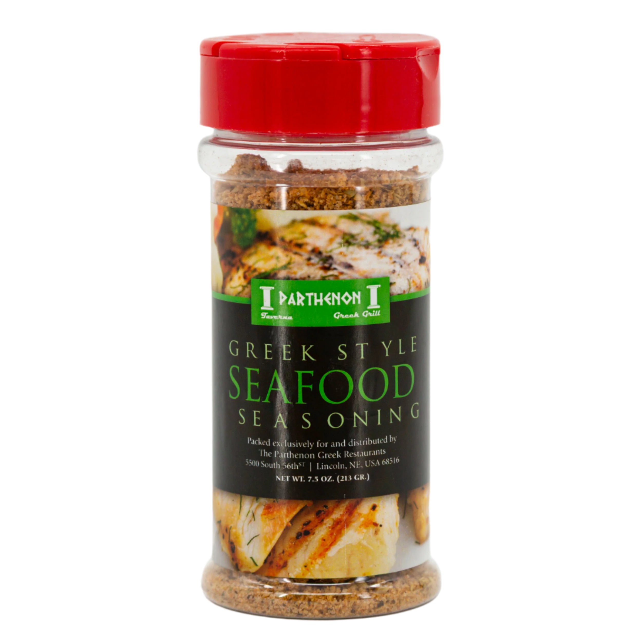 A bottle of Greek style seafood seasoning with a red cap and label displaying the product name and an image of a seasoned fish dish.