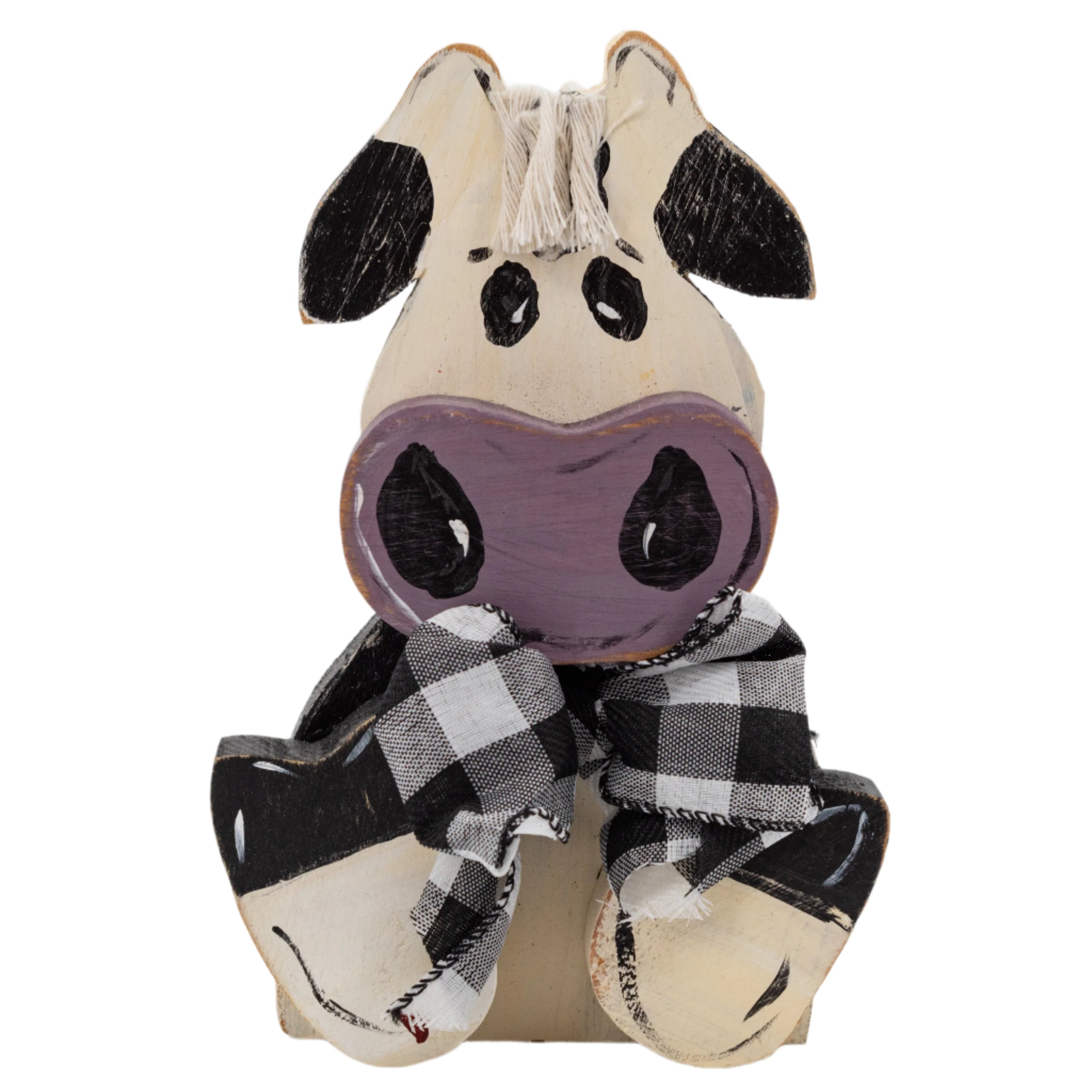 Decorative cow figurine with a checkered scarf on a white background
