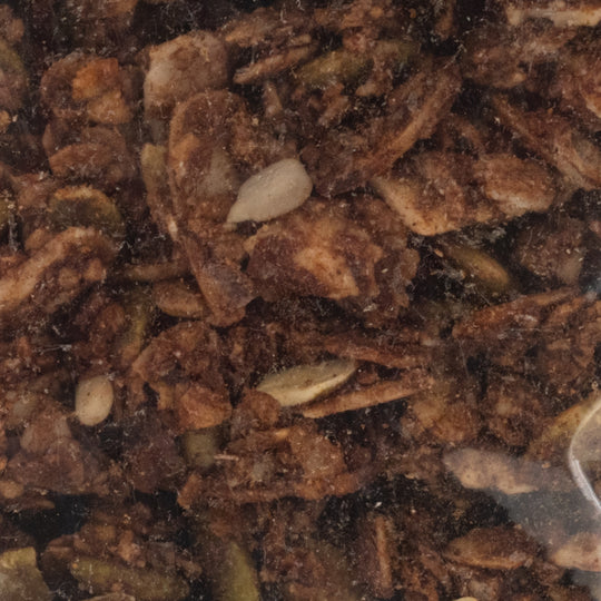Close-up of granola with a focus on texture and color.