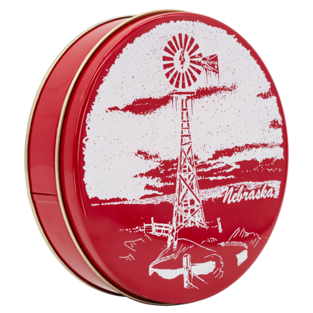 Red tin with white windmill design and 'Nebraska' text on a white background