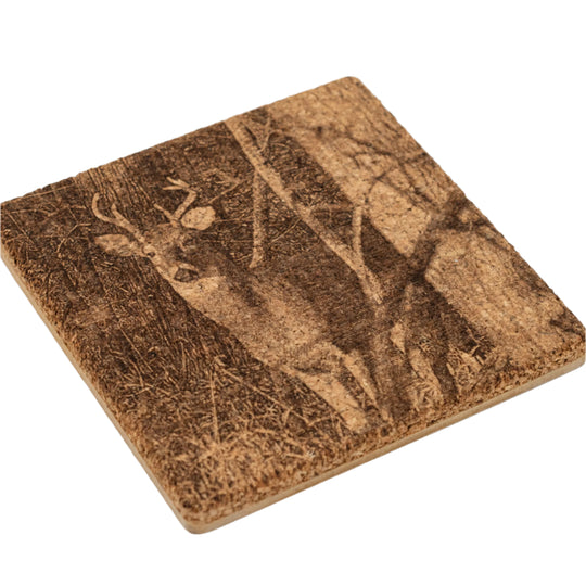 Cork coaster with a deer design on a white background
