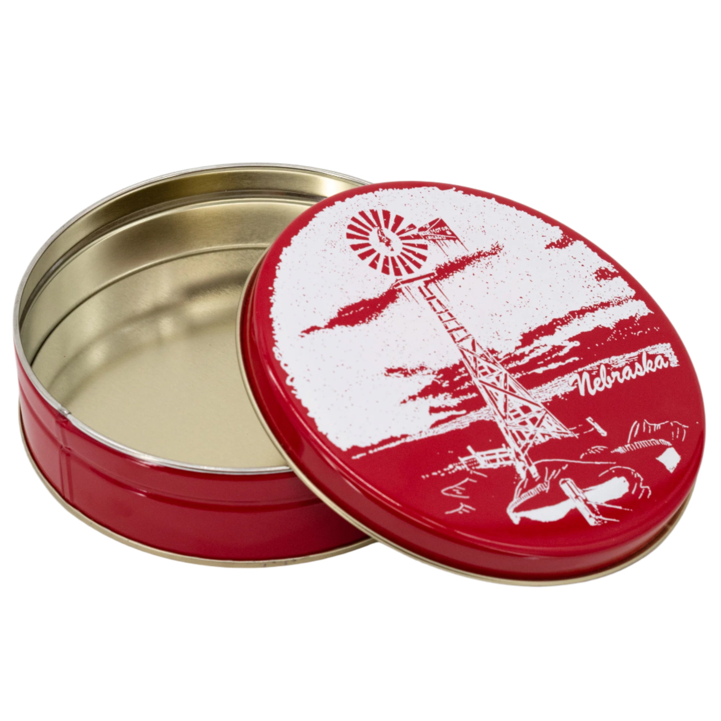 Red tin with a windmill design on a white background