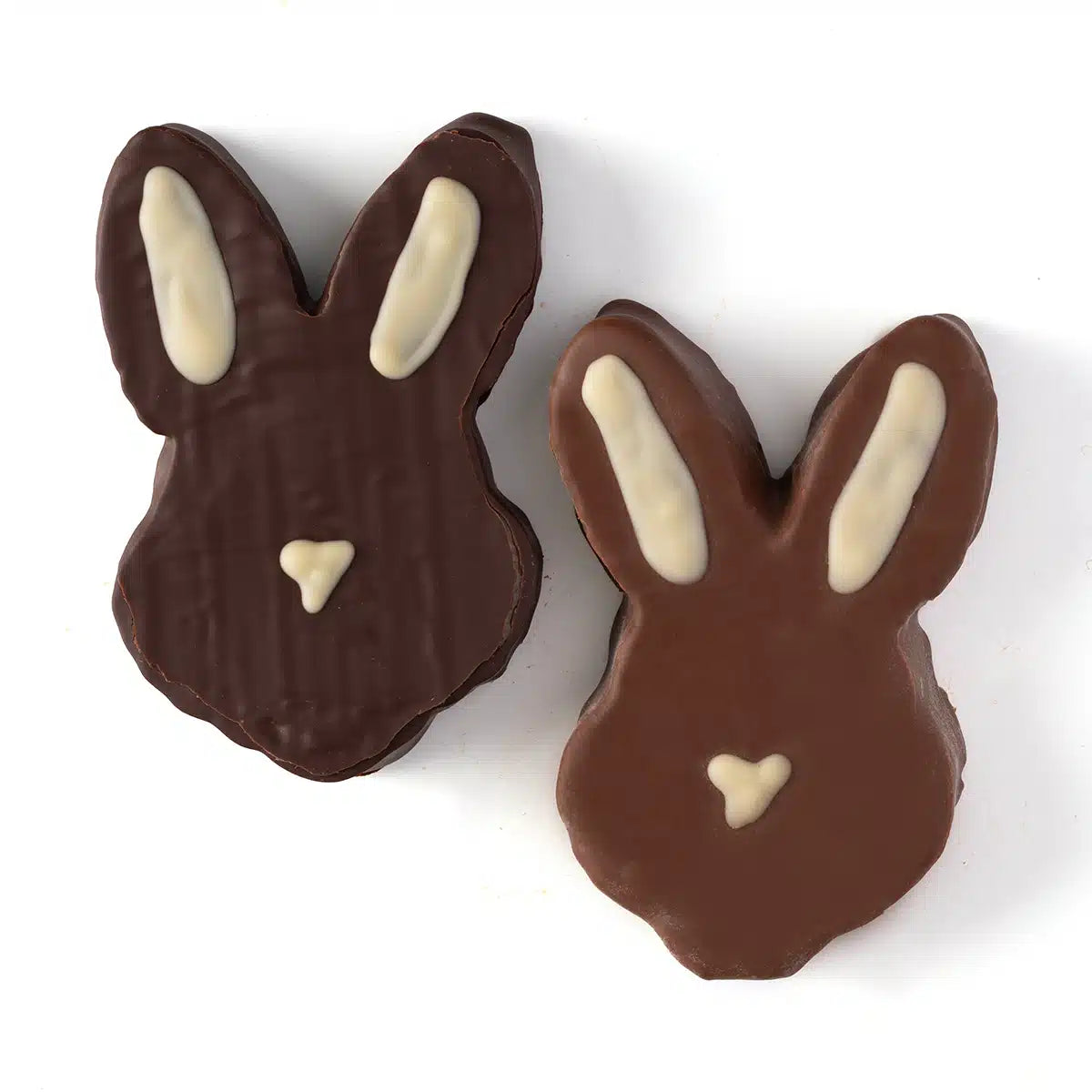 Two chocolate bunny candies on a white background