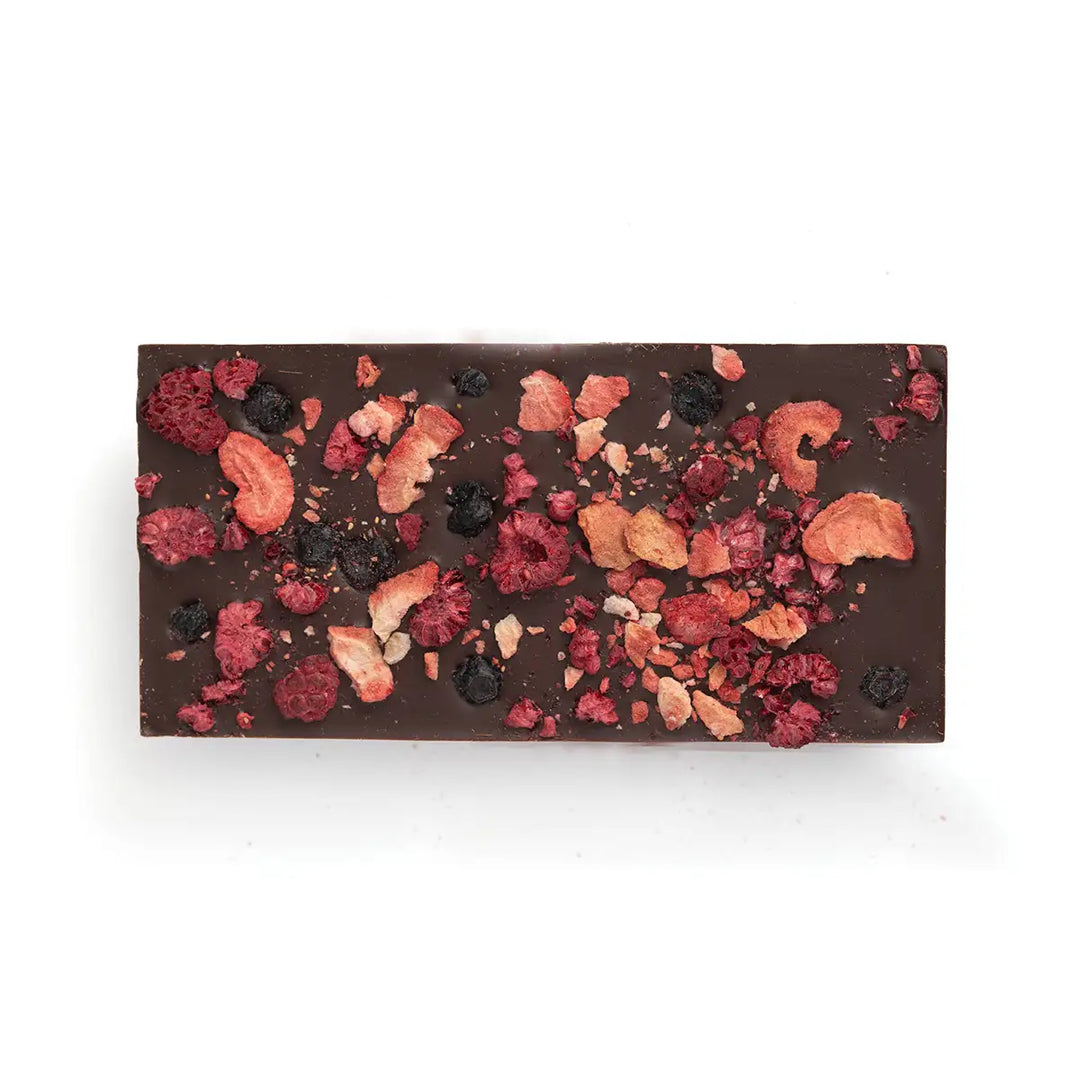 Chocolate bar with dried fruits and nuts on a white background