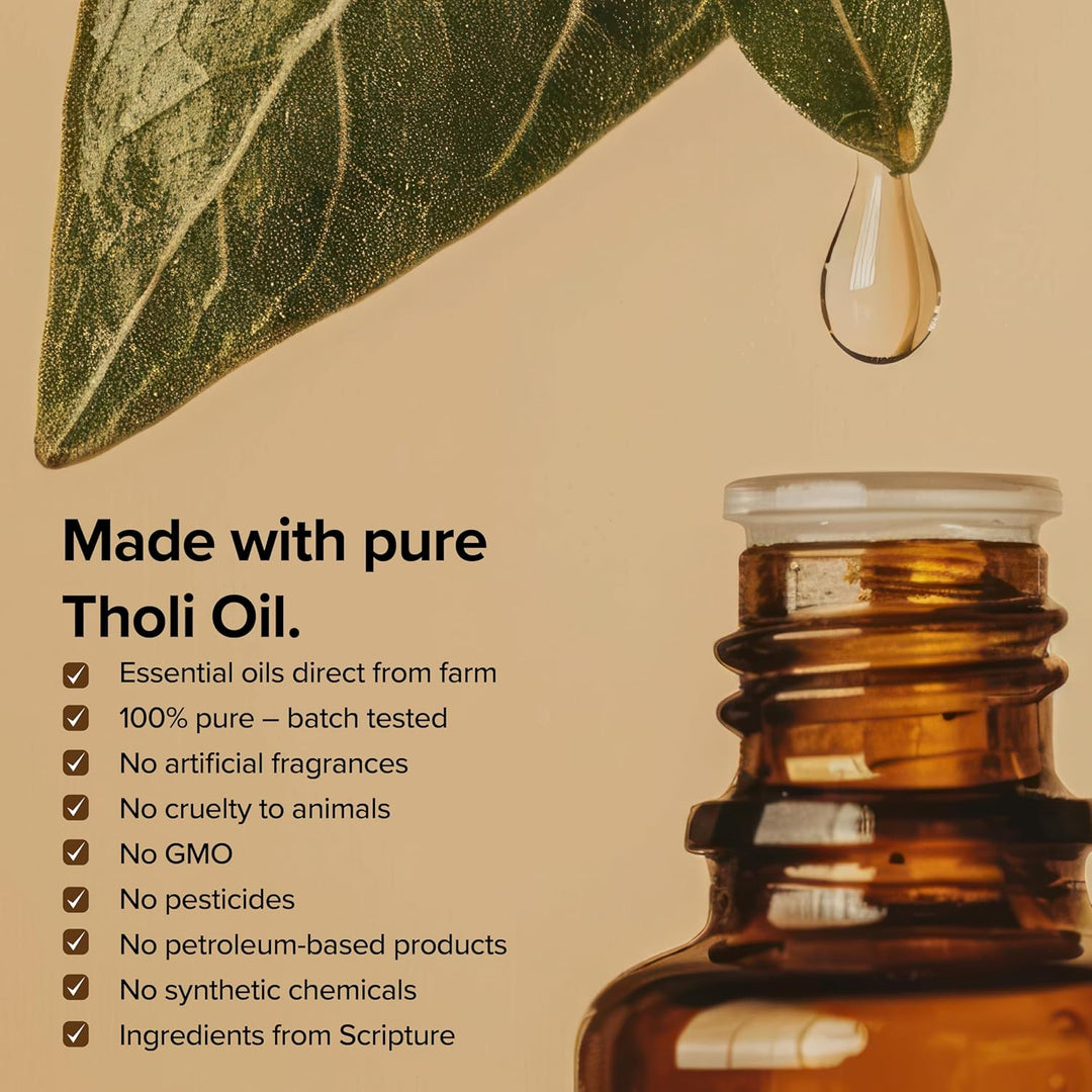 Bottle of Tholi Oil with a droplet and leaf on a beige background