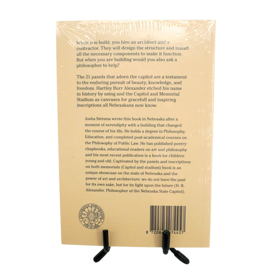 Back cover of a book with text and a barcode on a white background