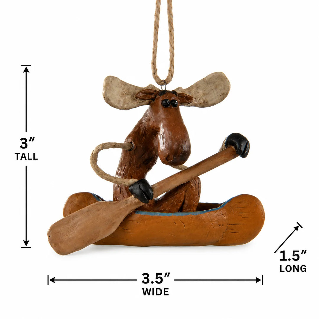 Wooden moose ornament with kayak and paddle, showing measurements on a white background