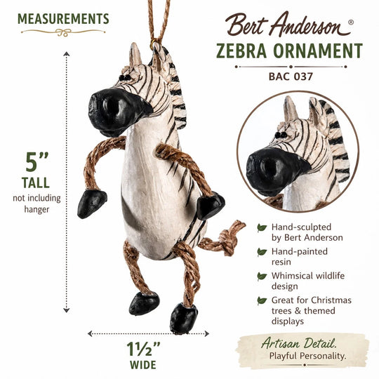 Bert Anderson Zebra Ornament product information graphic showing a hanging zebra ornament with dimensions labeled 5 tall and 1 1/2 wide, plus product features and a circular close-up inset on a white background.