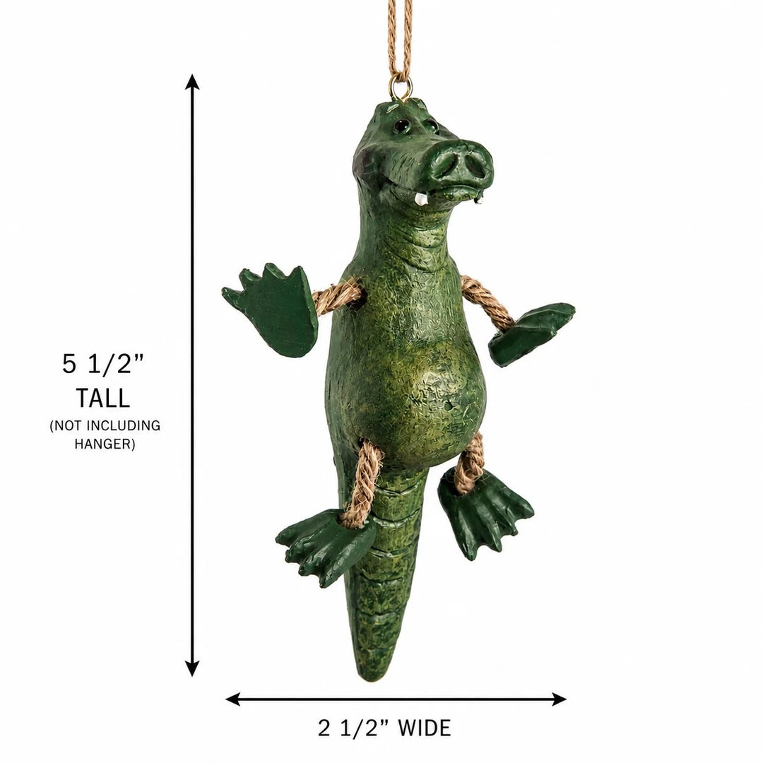 A green alligator hanging ornament with rope accents and a hanging loop, shown on a white background with dimension arrows indicating 5 1/2 inches tall and 2 1/2 inches wide.