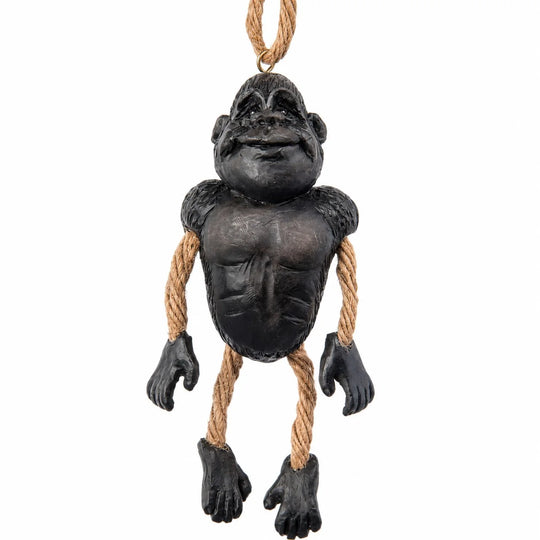 A novelty gorilla hanging ornament or decoration made of dark textured material with rope for arms and legs, suspended by a rope loop at the top, shown on a plain white background.