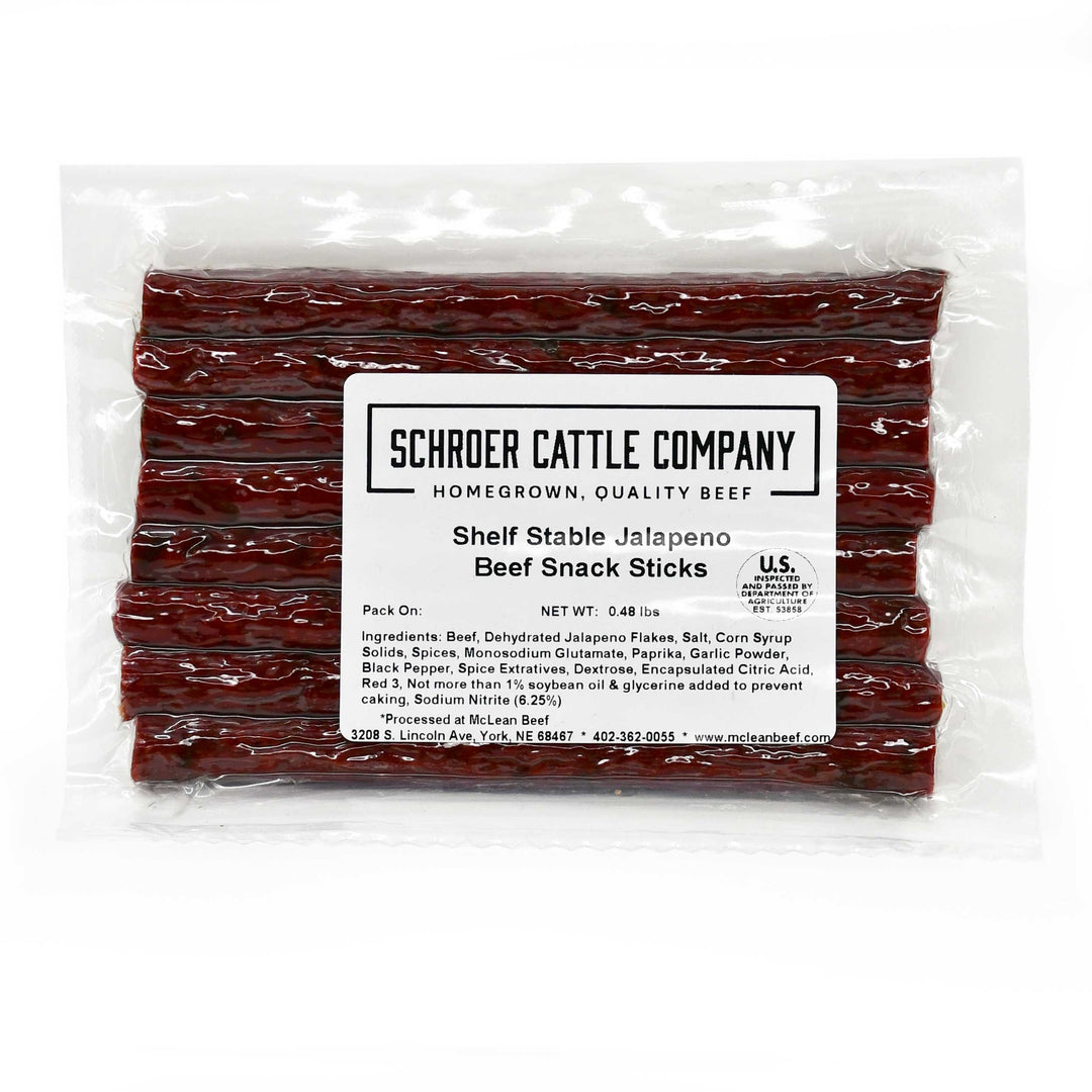 A package of Schroder Cattle Company Shelf Stable Jalapeño Beef Snack Sticks, showing the dark red cured beef sticks stacked inside a clear plastic bag with a white product label.