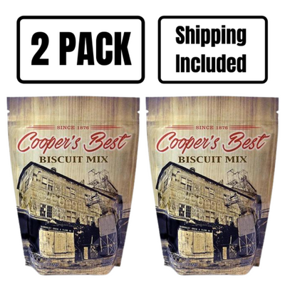 The front of two 2.5 lb. bags of Cooper's Best Biscuit Mix on a white background with 2 pack and shipping included text at top.