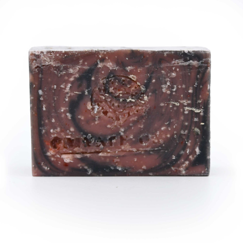 Bar of soap with a brand logo on a white background