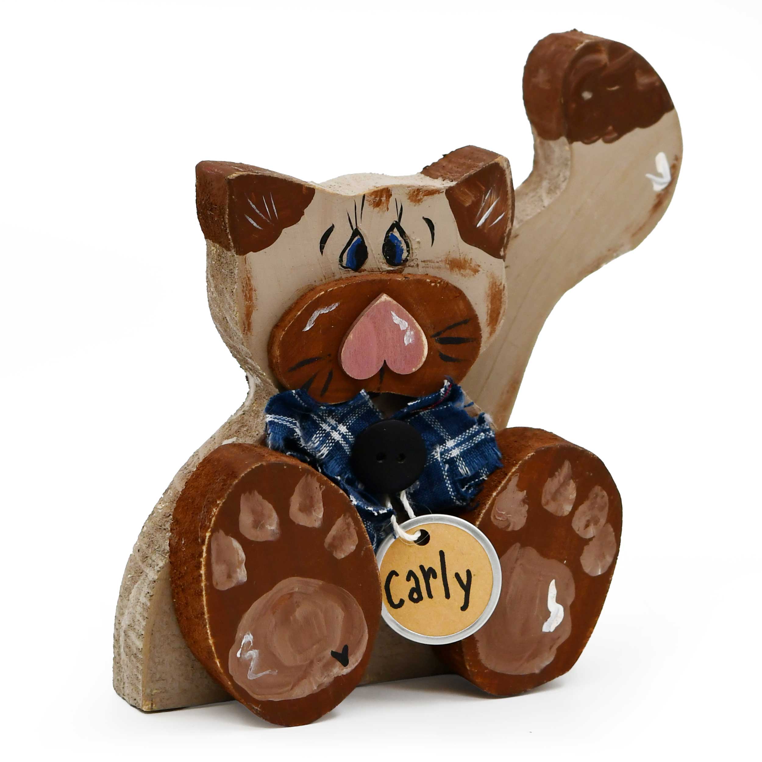 Wooden cat figurine with a paw-shaped tag labeled 'Carly' on a white background
