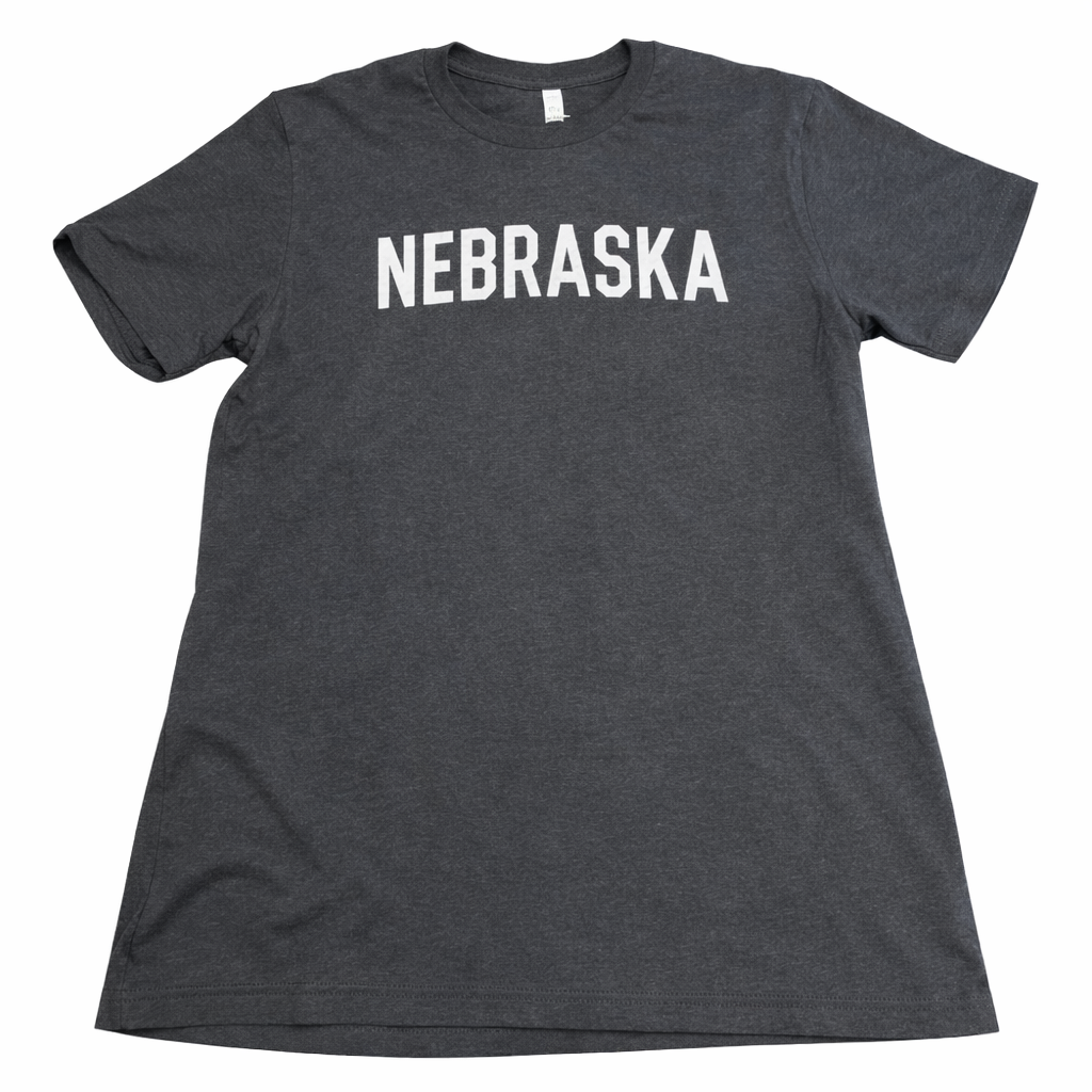Dark gray t-shirt with 'NEBRASKA' printed in white on a white background